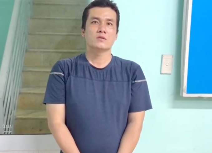 Trần Văn Hòa tại cơ quan điều tra. Ảnh: Công an TP HCM