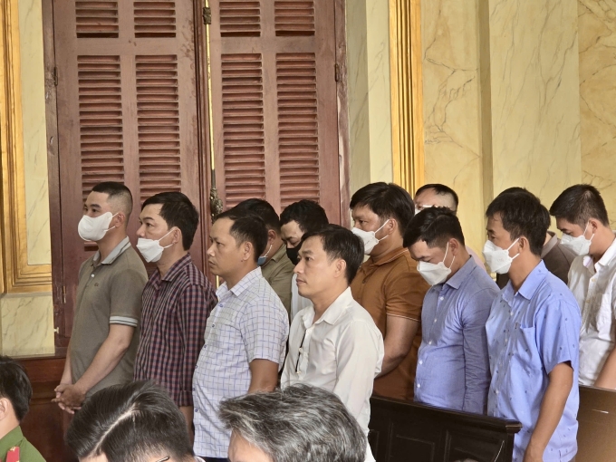 e93a3009866d07335e7c-177614668-6876-7010-1776146692 Các cựu cán bộ công an tham gia phiên tòa. Ảnh: Hải Duyên